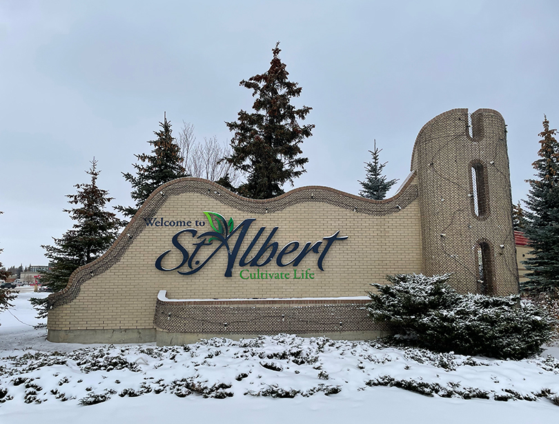 Welcome to St. Albert city sign in the snow.